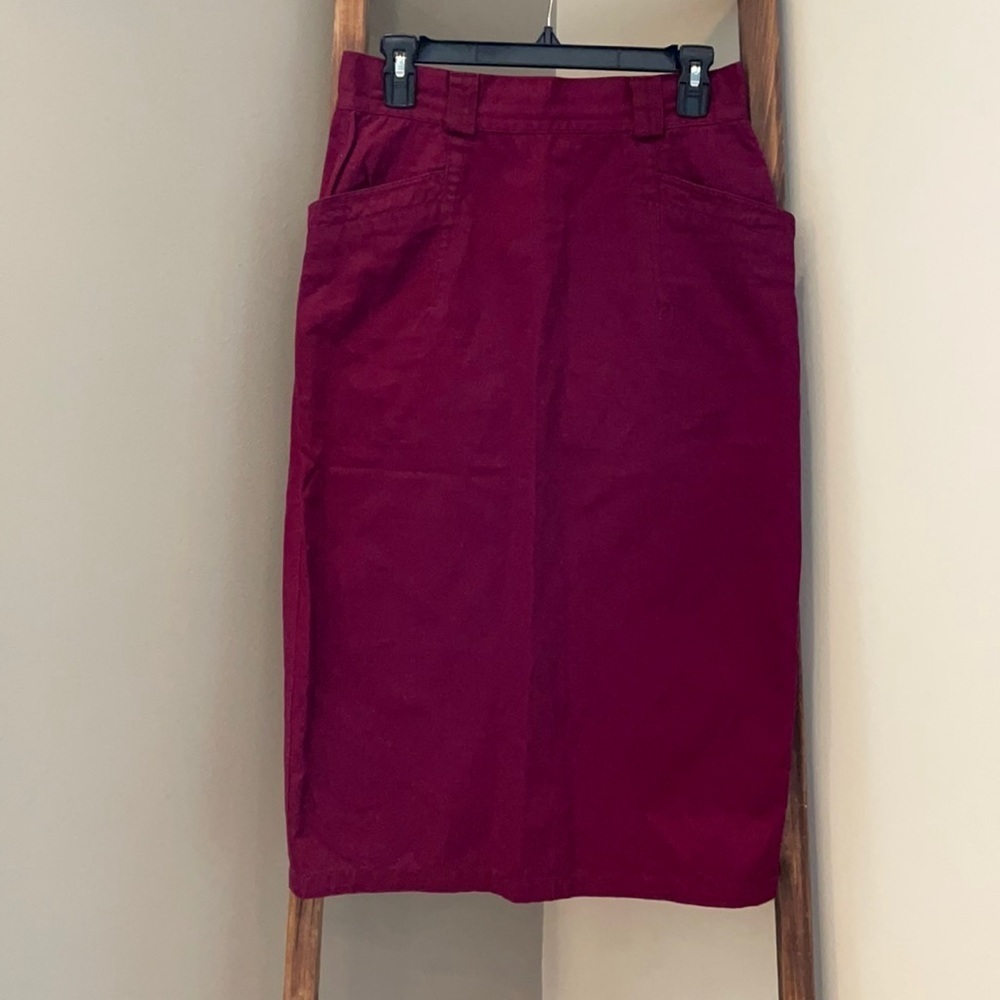Wine colored pencil skirt.